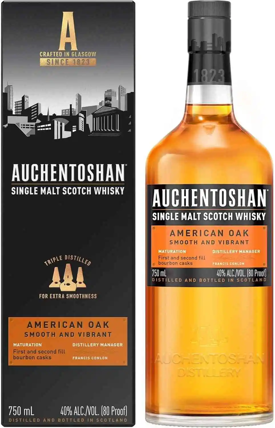 Garrafa de Whisky Auchentoshan American Oak ao lado da embalagem, com detalhes em preto e laranja.