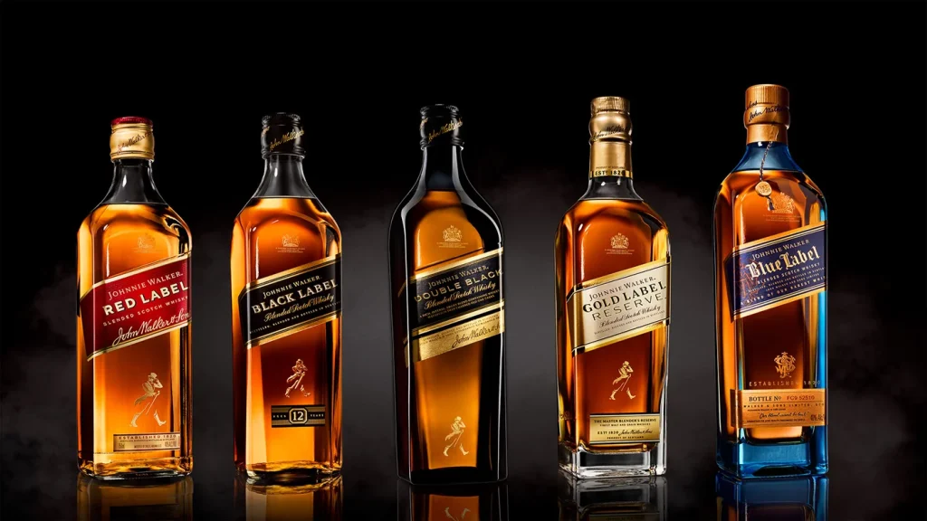 Garrafas de whisky Johnnie Walker Red Label, Black Label, Double Black, Gold Label Reserve e Blue Label, destacando os melhores whiskys Johnnie Walker.